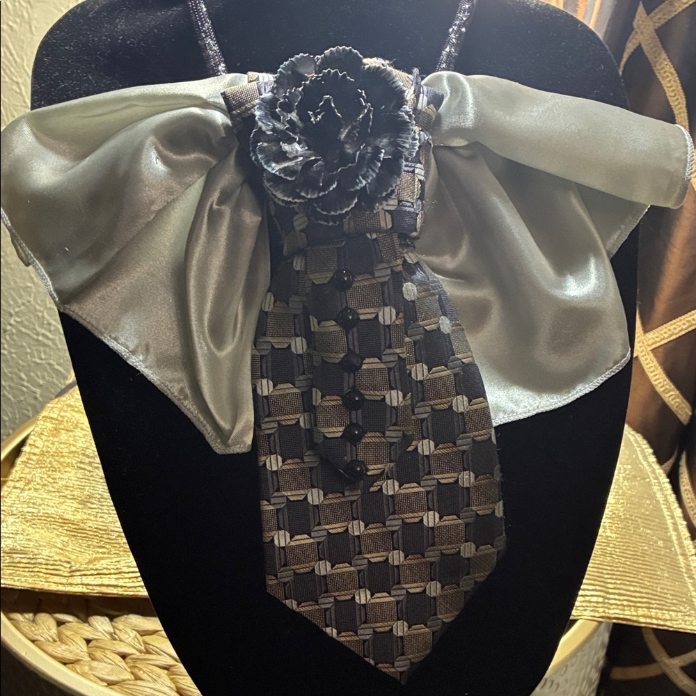 Chic Black and Silver Scarf with Floral Accent